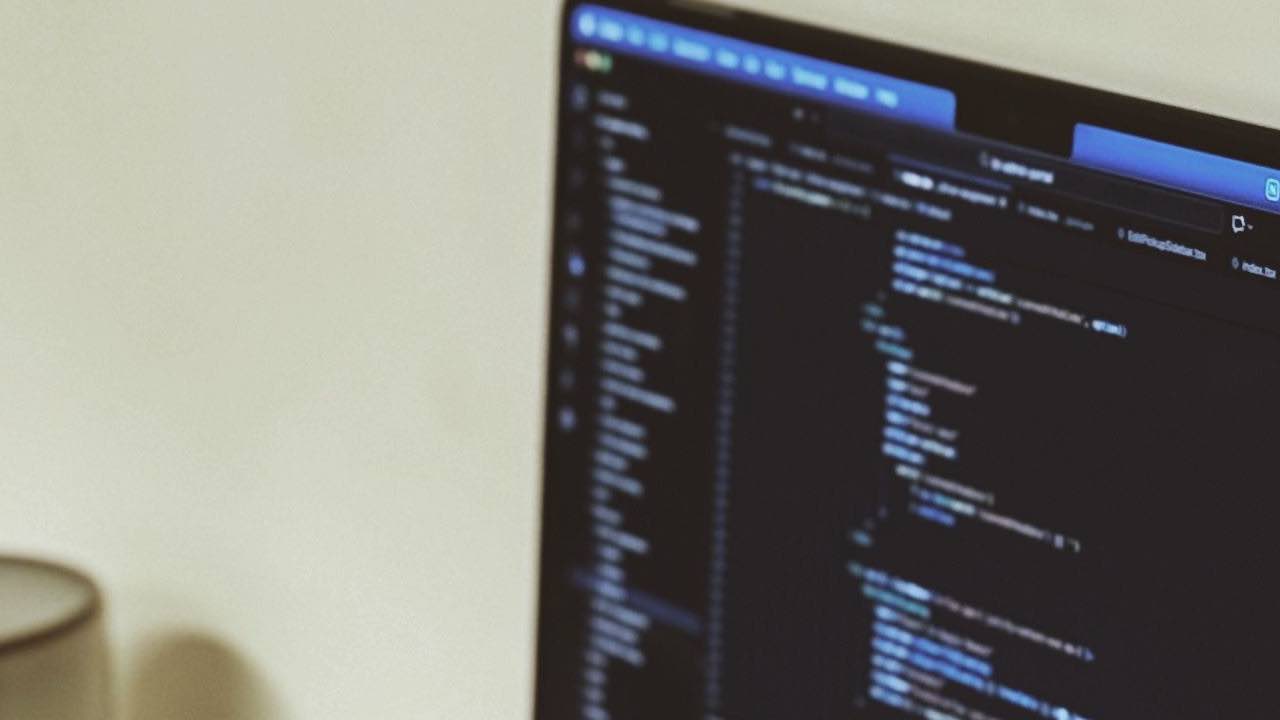 Developer workspace showing website technology detection results across multiple browser tabs